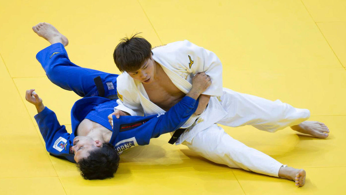 -66kg Gold: Abe (JPN)